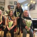 The Hayfield May Queen royal party for 2022, clockwise from back left, Tayhanna, Ella, Georgia, Tilly and Rose.