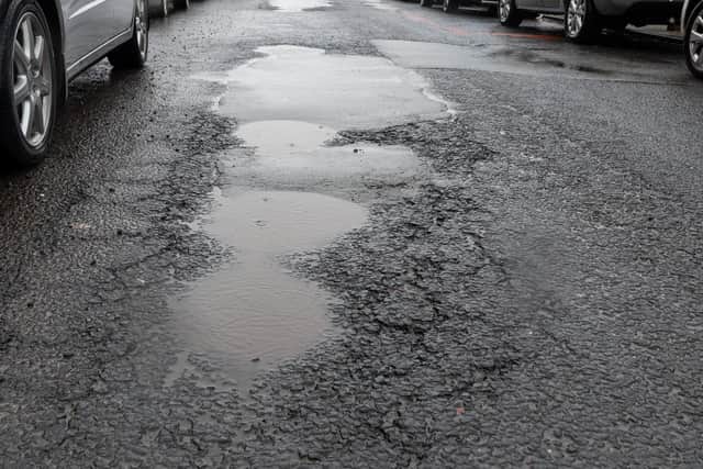 Buxton woman’s relief after pot hole fixed after more than a year.