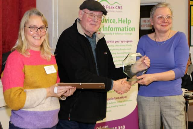 Owen Russell, middle, of Glossop Men’s Gang and Kath Sizeland, right, of Chapel Mobile Physiotherapy Service, receive awards for their services to the community from High Peak CVS' trustee Karen Rigg at its AGM