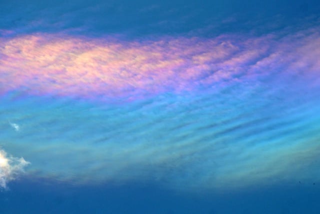 Here's a striking offering to enjoy from Nick Rhodes, showing rare nacreous or mother of pearl clouds, as seen from Hasland.