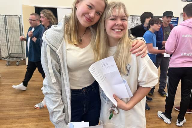Connie Skitt and Erin Babington from St Thomas More collecting their GCSE results. Pic submitted