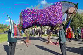 Watch as War Horse memorial gets purple poppy coat to remember fallen service animals