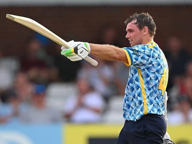 Tom Latham celebrates his century during f Birmingham Bears' huge win at Derbyshire Falcons.