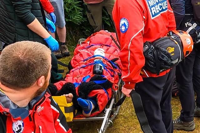 Buxton Mountain Rescue Team  assisting a climber who fell at Froggatt Edge on Saturday.