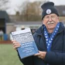 Tony Tomliunson with his book on Buxton FC's post war exploits. Photo Jason Chadwick