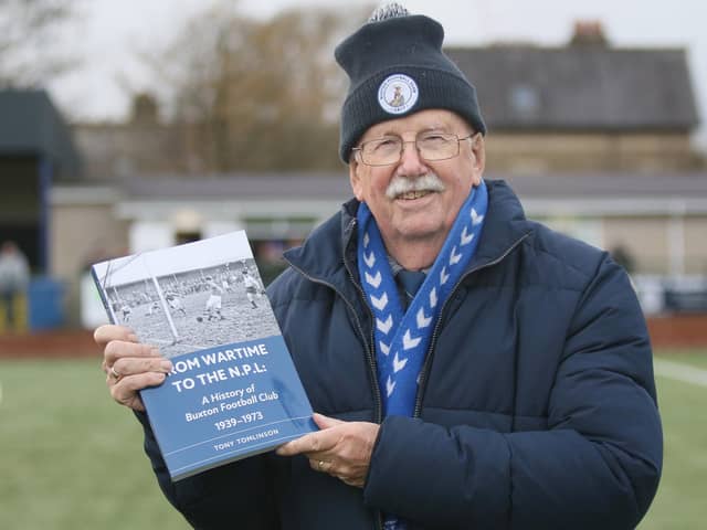 Tony Tomliunson with his book on Buxton FC's post war exploits. Photo Jason Chadwick