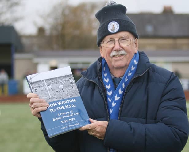 Tony Tomliunson with his book on Buxton FC's post war exploits. Photo Jason Chadwick