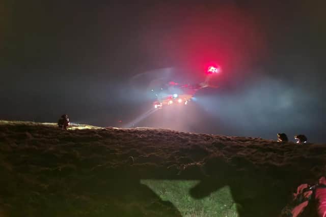 A coastguard helicopter was used in the operation. Photo: Glossop Mountain Rescue Team.