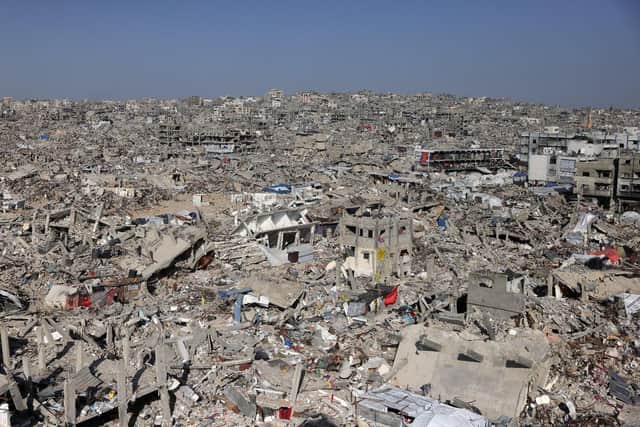 This aerial view shows a war devastated neighbourhood in the Jabalia refugee camp in the northern Gaza Strip on April 2, 2025. Israeli Prime Minister Benjamin Netanyahu said on April 2 that the military was "dissecting" the Gaza Strip and seizing territory to pressure Hamas into freeing hostages still held in the territory. (Photo by BASHAR TALEB/AFP via Getty Images)