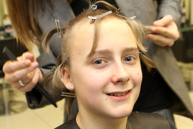 Ewan Mitchell having his hair shaved into spots and tufts back in 2011 by Toni and Guy's Peter Robinson. Photo Jason Chadwick