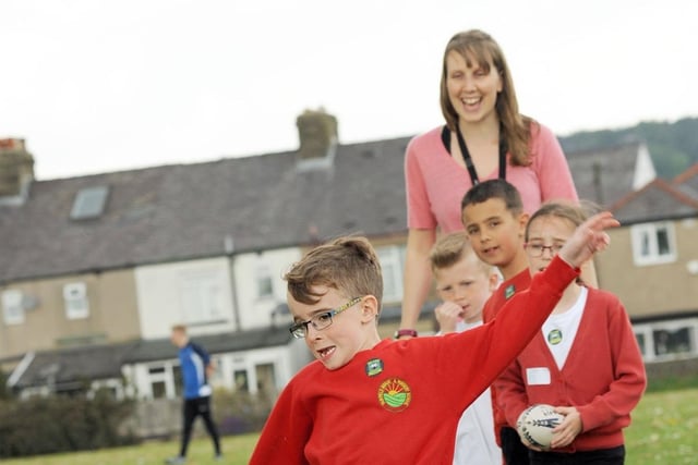 Pupils from Fairfield Infant School try out different sports which were showcased to their parents to give ideas and inspiration for school holiday activities, including tag rugby providers, RuggerEds.