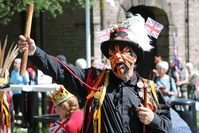 For the Whaley Bridge Platinum Jubilee Parade, the Powderkegs Morris team sported Union Jack face paint in their traditional colours
