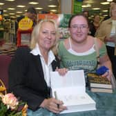 Pictured at W H Smiths, Meadowhall, where writer Martina Cole was seen signing copies of her book The Take. With her is fan Maria Oflaherty from Wincobank, Sheffield.
