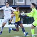 Warren Clarke hailed the battling spirit shown by Buxton as they saw the game out to get three points against Witton Albion.