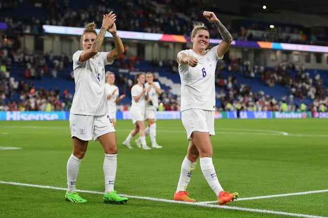 Rachel Daly and Millie Bright acknowledge the fans after their side's.
