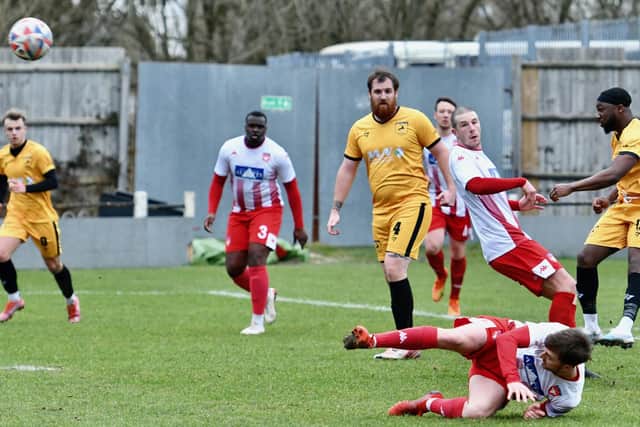 New Mills - four points in four days to keep play-off dream alive. Photo by John Fryer.