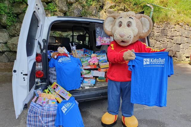 Gulliver’s mascot Gully with a haul of toys donated at the successful Toy Bank weekend held in 2024.