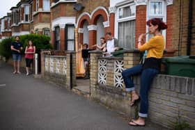 The survey found that more than half, 51 percent, of respondents would pay one to three percent more than the house is worth for good neighbours. (Photo by Leon Neal/Getty Images)