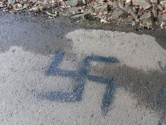The swastika graffiti in New Mills.