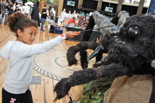 Harry Potter event at Devonshire Dome.    
Samia Jallow, 8, springs into action with a giant spider.