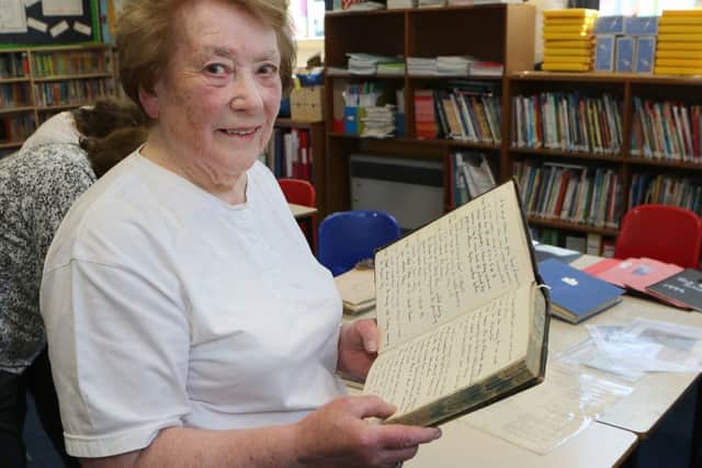 Peak Forest School 150th anniversary, Christine Gregory finds an entry about herself in the School's old log book from the 1940s. She later met her husband at a dance in the same classroom