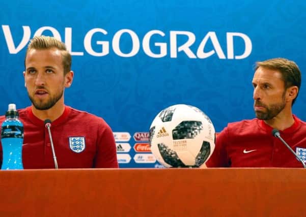 England captain, Harry Kane (left) with England manager, Gareth Southgate, in Volgograd.