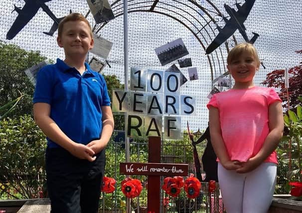Chaucer Junior School pupils (Ilkeston) Daniel Littlewood, of  Year 6, helped with the display to commemorate the 100th anniversary of the RAF, and Charlotte Sisson, of Year 4, brought in some photos for the display of her great grandfather.