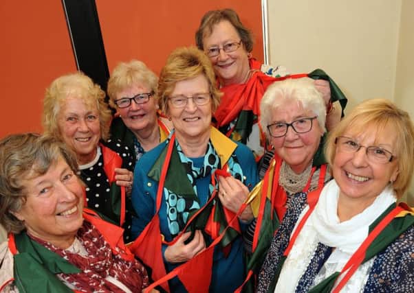 Ellen Woolliscroft, third right, the President of the Buxton WI, gees up her committee members for a big fundraising push to get Christmas lights for The Slopes.