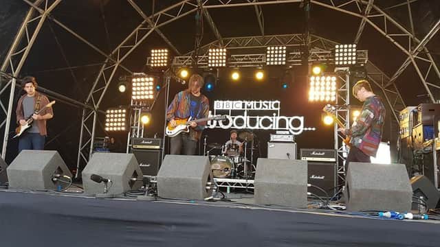Wuzi performing at Reading Festival after winning  a competition to play on the BBC introducing stage
