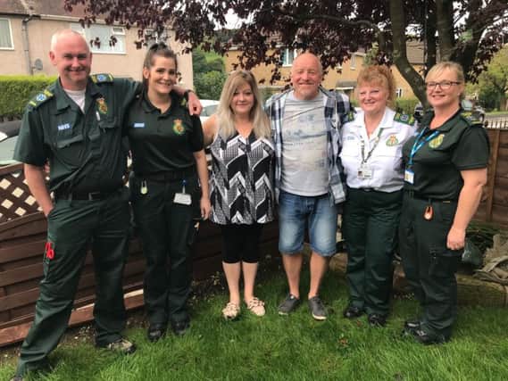 From left, Karl Bexon paramedic, Jessica Bate technican, Wendy Openshaw, Anthony Openshaw, Lesly Dudley 999 call handler and Louise Barlow paramedic were reunited after Anthony had a heart attack in April and he wanted to thank his lifesavers