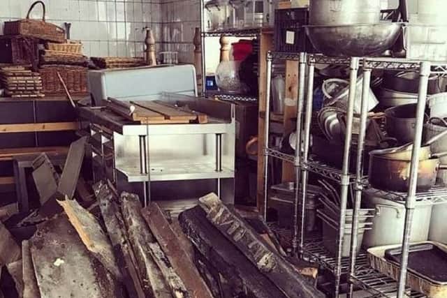 Inside the cafe following the fire. Picture posted on The Cafe @ Green Pavilion's Facebook page.