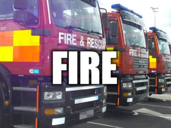 Two people were rescued from a house blaze yesterday.