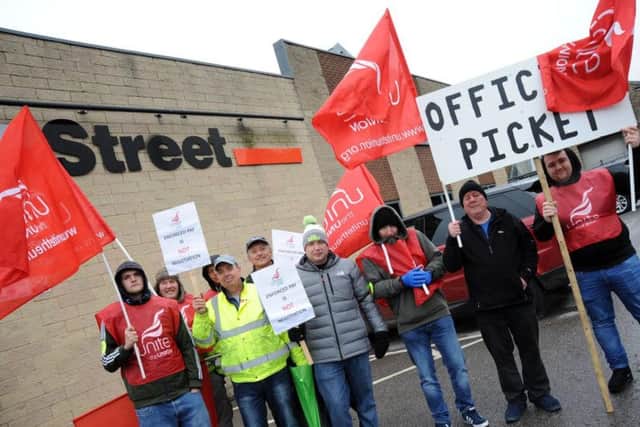 The picket line protest outside Street Crane on Monday.