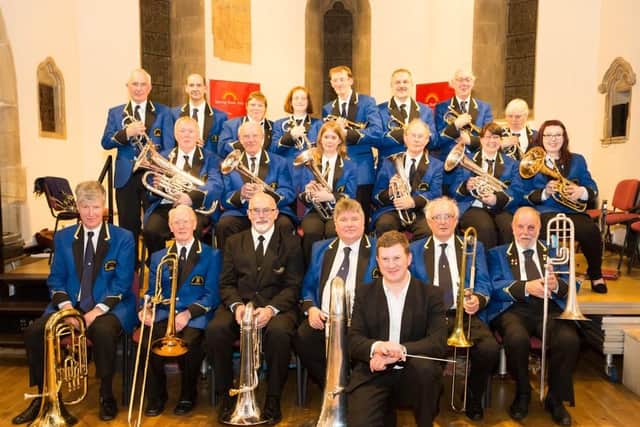 The concert had added poignancy for New Mills Band.