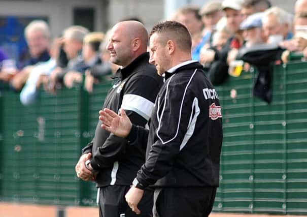 A shock for managers Steve Halford and Paul Phillips.