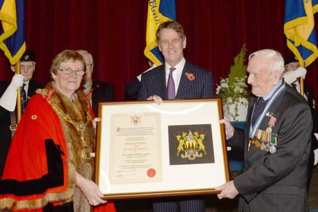High Peak Mayor Linda Grooby presents the scroll to the Chapel-en-le-Frith branch