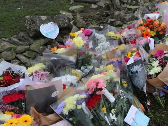 Floral tributes left at the scene