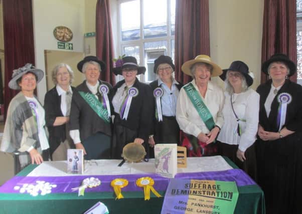 Chinley and Buxworth WI members dress as Suffragettes to mark UK Parliament Week.