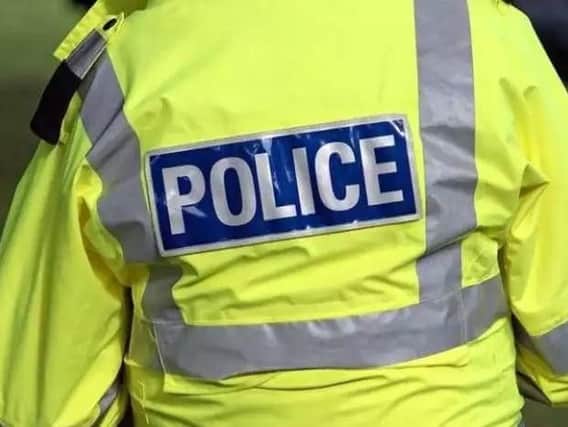 Police are appealing for information after a woman was bitten by a dog in Buxton