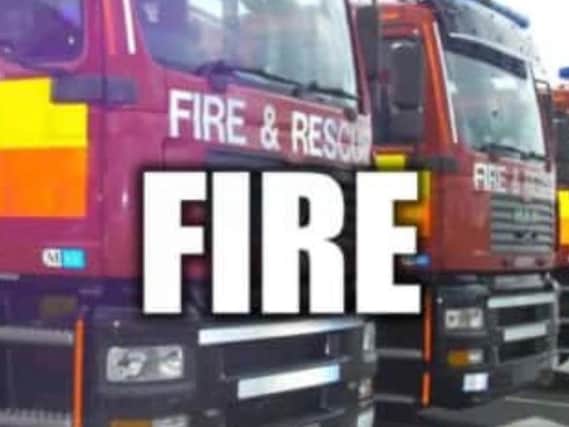 Derbyshire Fire & Rescue Service have released four people trapped in a lift in Glossop.