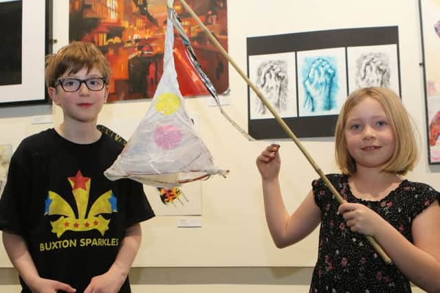 Oliverr Cook and Maise Ambrose with a finished lantern.