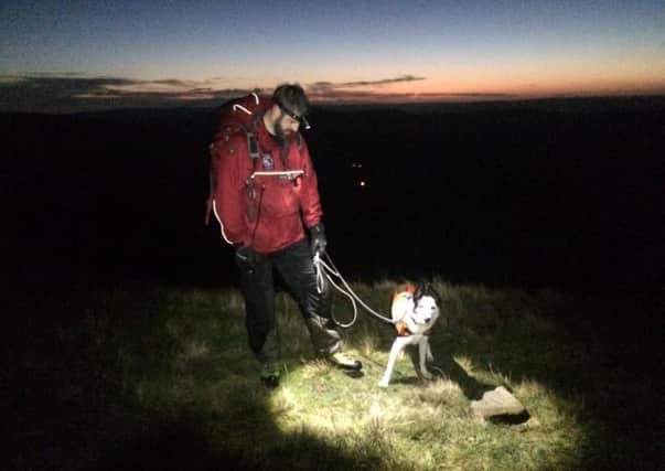 Mountain rescue teams were joined by Search and Rescue Dog Association's search dog Flo in their operation to find two missing walkers who had been hiking around Edale.