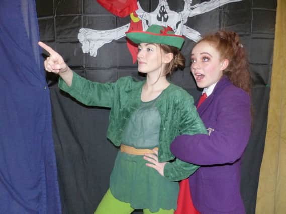 Minnie Hibbert as Peter Pan and Ellie Craufurd-Stuart as Wendy in Captain Hook's Revenge, presented by Buxton Drama League.