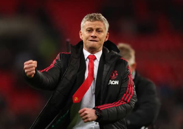 LONDON, ENGLAND - JANUARY 13: Ole Gunnar Solskjaer, Interim Manager of Manchester United celebrates victory after the Premier League match between Tottenham Hotspur and Manchester United at Wembley Stadium on January 13, 2019 in London, United Kingdom. (Photo by Catherine Ivill/Getty Images)