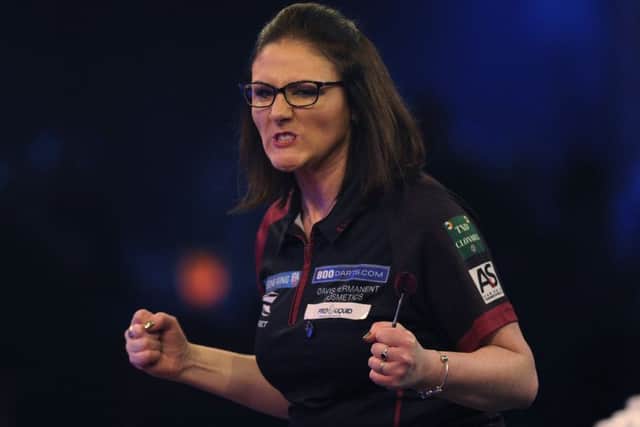 CAMBERLEY, ENGLAND - JANUARY 10: Lorraine Winstanley of England celebrates winning her quarter-final match against Trina Gulliver MBE of England during Day Six of the BDO World Darts Championship at Lakeside Country Club on January 10, 2019 in Camberley, England. (Photo by Alex Burstow/Getty Images)