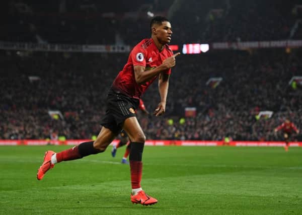 MANCHESTER, ENGLAND - JANUARY 19: Marcus Rashford of Manchester United celebrates after scoring his sides second goal during the Premier League match between Manchester United and Brighton & Hove Albion at Old Trafford on January 19, 2019 in Manchester, United Kingdom. (Photo by Gareth Copley/Getty Images)