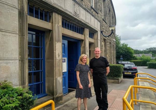Ruth George with Inspector Phil Booth outside Buxton police station.