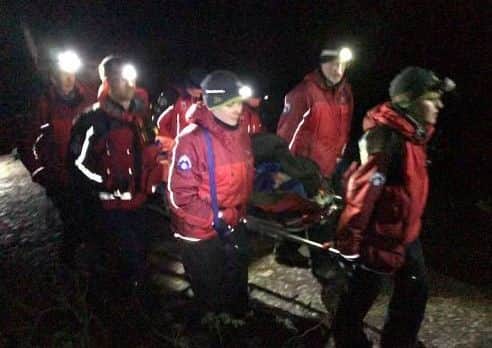 Mountain rescue team drills.