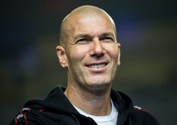 Former French football player Zinedine Zidane looks on during a promotional event for the Chinese University of Football Association in Guangzhou, in China's southern Guangdong province on November 30, 2018. (Photo by - / AFP) / China OUT (Photo credit should read -/AFP/Getty Images)