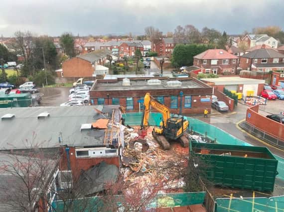 Work is underway to demolish old wards at Stepping Hill Hospital as part of a long-term renovation and improvement project.